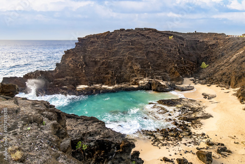 Halona Beach, nestled in a rocky cove with breaking Pacific waves on the Hawaiian Island of Oahu, was made famous in the movie, “From Here to Eternity.”