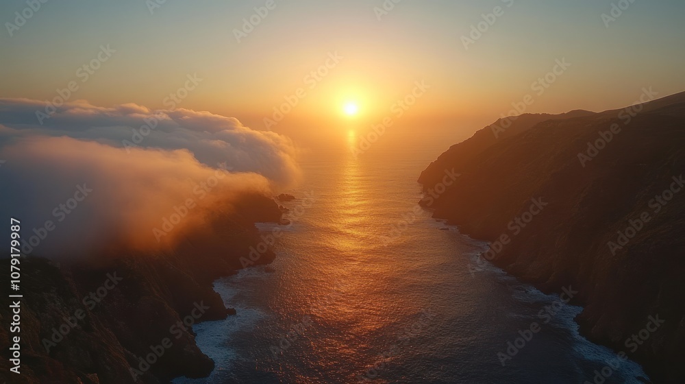 Fototapeta premium Sunset Over a Sea Channel Between Rugged Cliffs