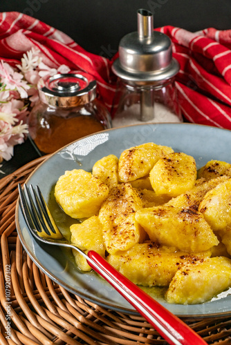 Homemade lazy noodles with cheese, crumbs and melted butter.