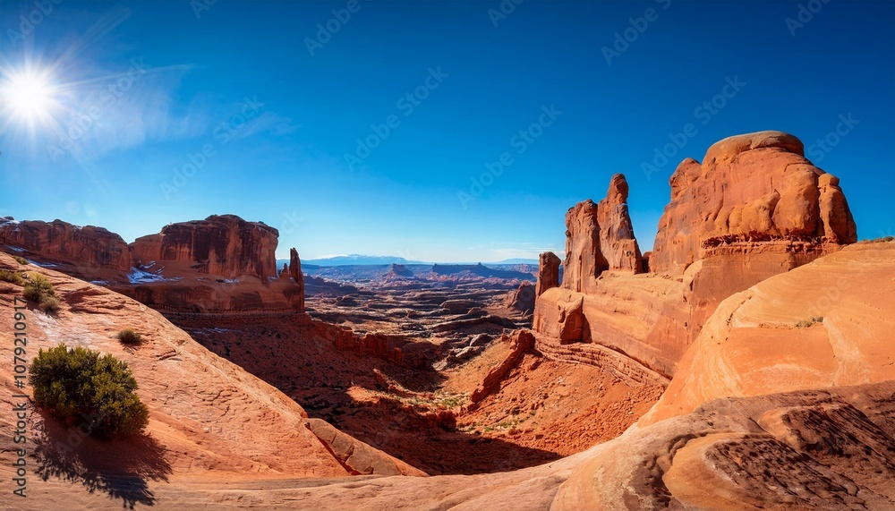 Sunlit Wonders: Panoramic Views of Arches National Park Sunlit Wonders: Panoramic Views of Arches National Park