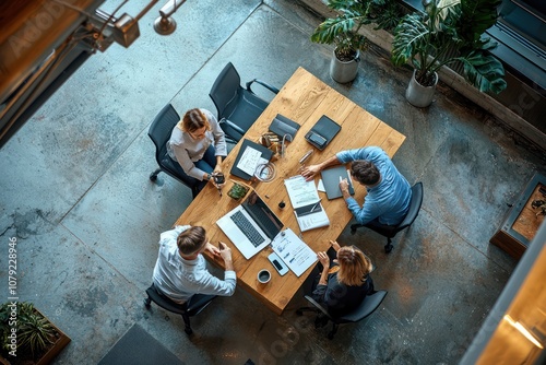 Business professionals meeting in a corporate office. Collaborative discussion and brainstorming for a new business strategy photo