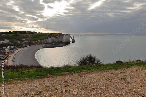 Town beach, chalk Falaise d'Aval Cliff, wave-carved Porte d'Aval Arch, Aiguille Creuse Needle, from atop the Falaise d'Amont Cliff. Etretat-France-007