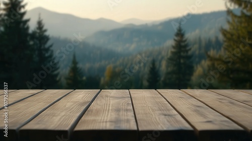 Wooden table overlooking a mountain landscape during sunset hours