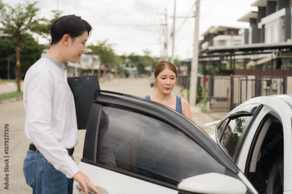 Car Salesman and Customer: A professional car salesman opens the door of a new car for a happy customer, showcasing the personalized experience of purchasing a new vehicle. Car Salesman and Customer: A professional car salesman opens the door of a new car for a happy customer, showcasing the personalized experience of purchasing a new vehicle.