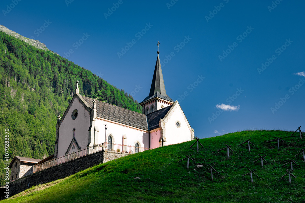 Alpine church with mountains in the background, Trient, Switzerland Alpine church with mountains in the background, Trient, Switzerland