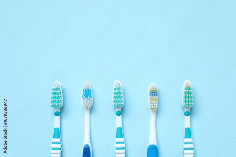 Various toothbrushes on a color background. Concept of tooth treatment and dental care Various toothbrushes on a color background. Concept of tooth treatment and dental care