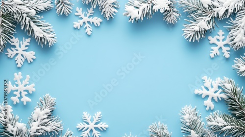 Pastel blue christmas background with snowflake border for text