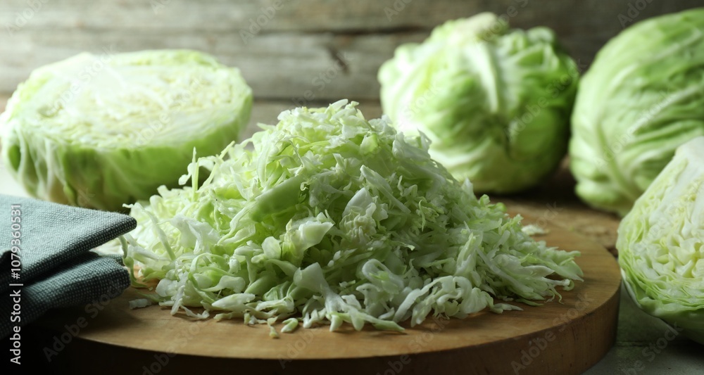 Fresh shredded cabbage on light table, closeup Fresh shredded cabbage on light table, closeup