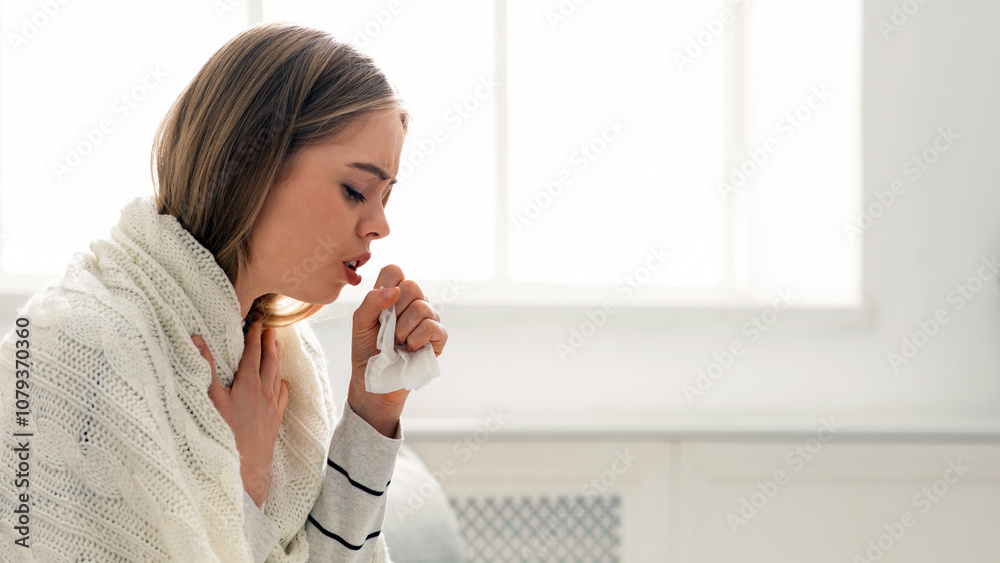 Covid-19 infection. Sick young woman coughing at home, empty space Covid-19 infection. Sick young woman coughing at home, empty space