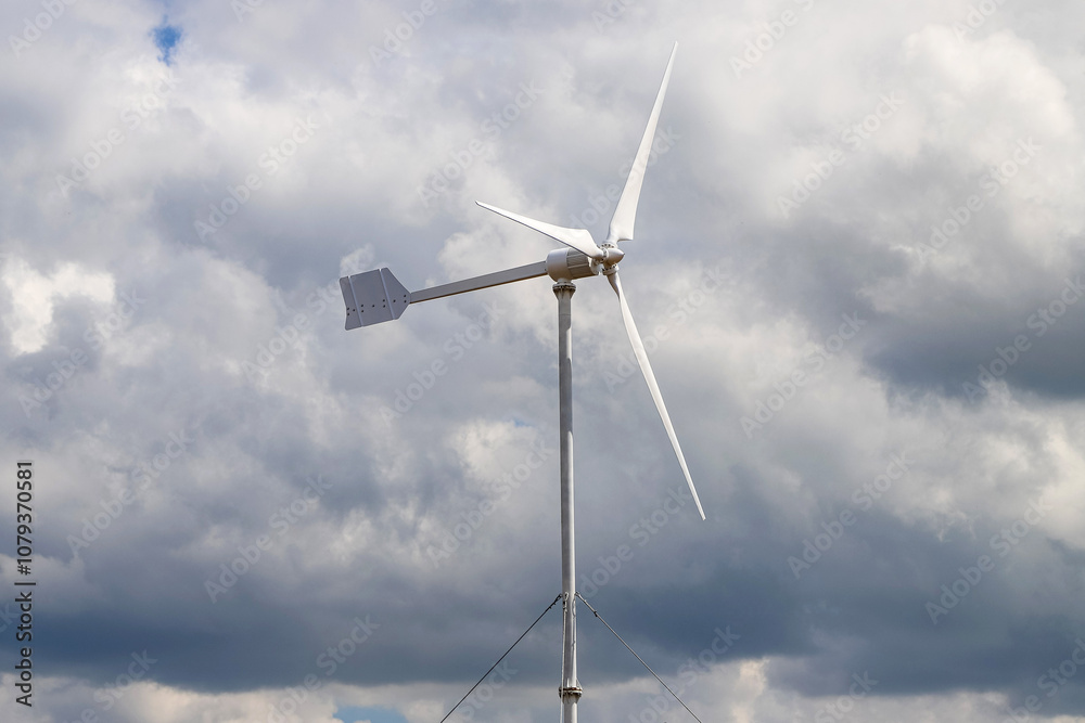 Windmill as a source of renewable energy and sustainable resource. Wind turbine. Windmill as a source of renewable energy and sustainable resource. Wind turbine.