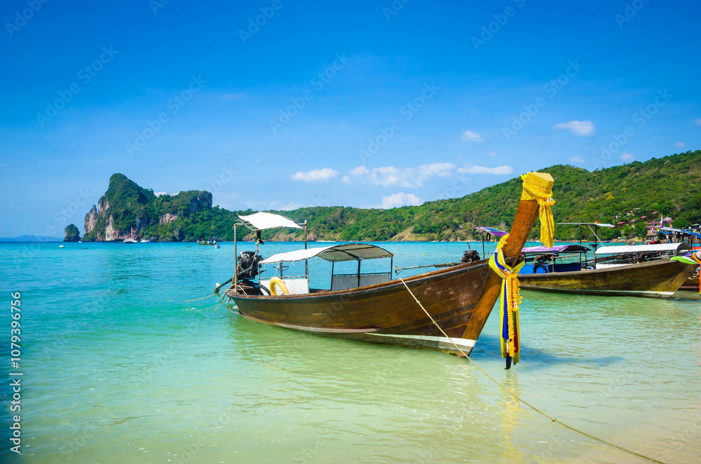 Traditional longtail boats near beautiful tropical island Ko Phi Phi, Thailand