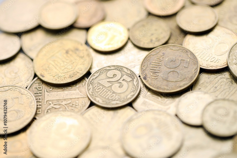 Big pile of different coins from various time period in Ukraine. Shiny Ukrainian money background Big pile of different coins from various time period in Ukraine. Shiny Ukrainian money background