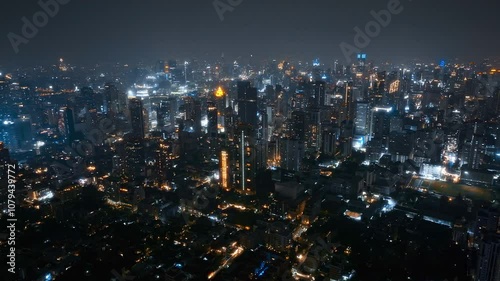 Wallpaper Mural Explore the vibrant nightlife of Bangkok as city lights twinkle and skyscrapers illuminate the skyline during the enchanting hours after sunset Torontodigital.ca