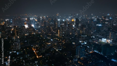 Wallpaper Mural Explore the vibrant nightlife of Bangkok showcasing illuminated skyscrapers and bustling streets in the heart of the city after sunset Torontodigital.ca