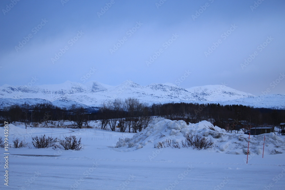 Winter landscapes in Norway showcase serene snowy mountains, icy fjords, and peaceful coastal views. Capturing the beauty of snow-covered trees, quiet roads, and glowing sunsets creates a sense of cal Winter landscapes in Norway showcase serene snowy mountains, icy fjords, and peaceful coastal views. Capturing the beauty of snow-covered trees, quiet roads, and glowing sunsets creates a sense of cal