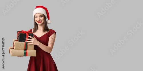 Pretty young woman in Santa...