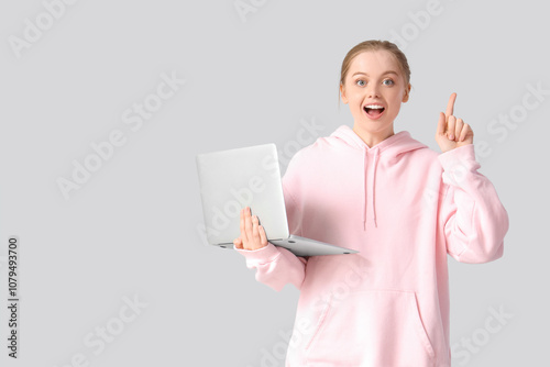 Surprised young woman with ...