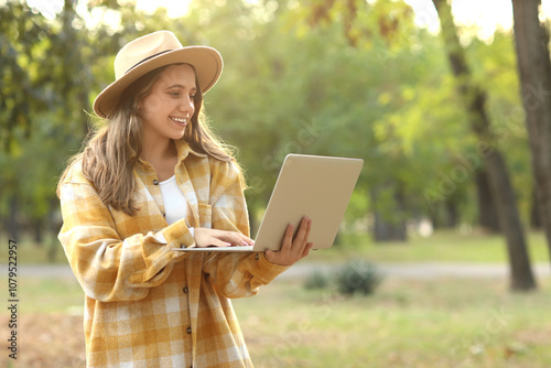 Female tourist using laptop...