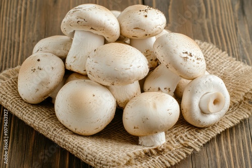 Mushrooms Artistically Arranged on Rustic Burlap Cloth