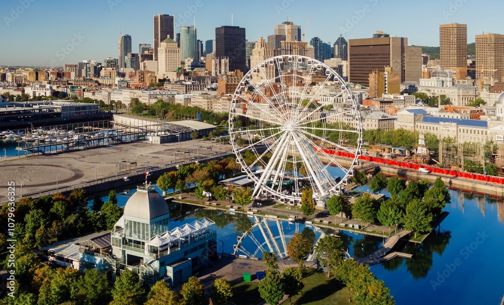 Fototapeta premium Ferris Wheel, Vieux-Port de Montréal and downtown city skyline, Montreal, Quebec, Canada.