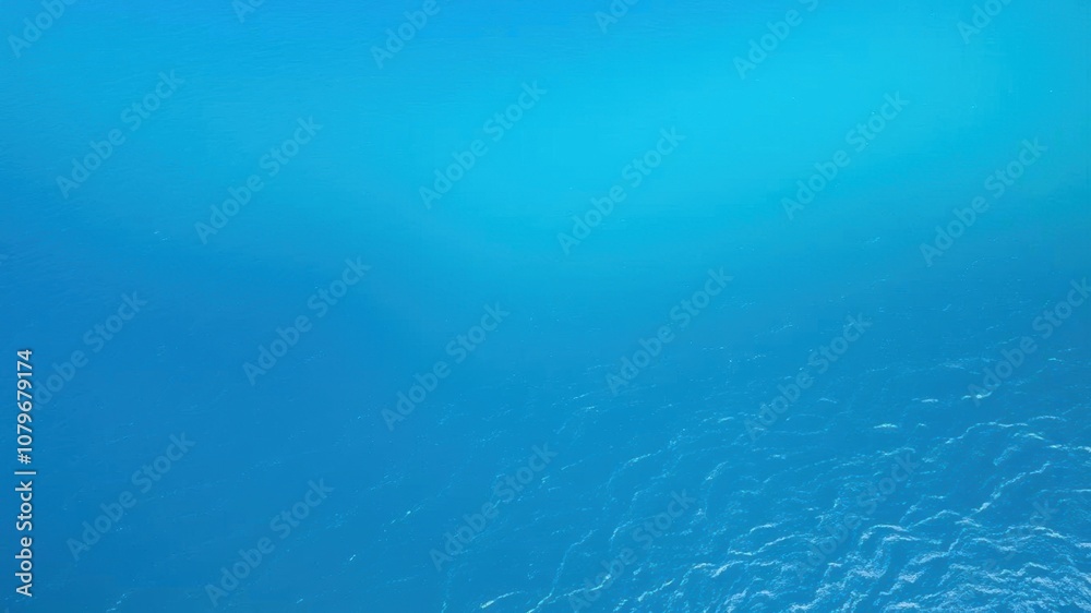Obraz premium A breathtaking aerial view of the vast blue ocean with gentle waves, revealing a stunning gradient of deep navy to aquamarine hues, horizon, beauty