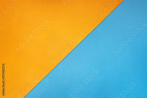 中央が明るい斜めに分けられたオレンジ色と青色の背景素材