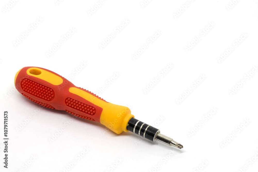 A close-up image of a red and yellow screwdriver with a comfortable rubber grip, designed for easy handling and precision work. A close-up image of a red and yellow screwdriver with a comfortable rubber grip, designed for easy handling and precision work.