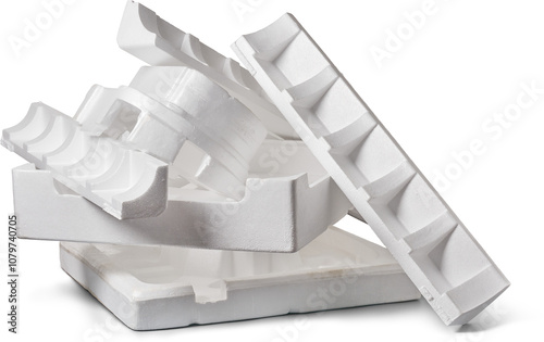 pile of styrofoam pieces used as protective product packaging isolated white background, environmental hazard discarded foam pieces, recycling or reuse concept photo