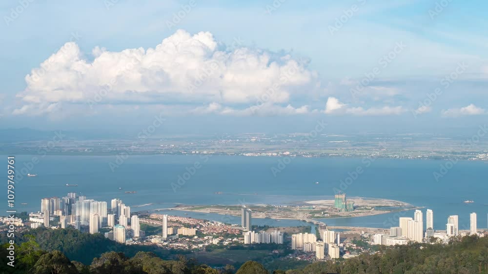 Georgetown skyline and coastal view with evening clouds over the sea in a hyperlapse shot Georgetown skyline and coastal view with evening clouds over the sea in a hyperlapse shot