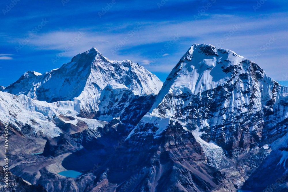 Stunning view of Mount Makalu summit and south west face,8485m,5th highest mountain with Chamlang,7319 m in the foreground seen from summit of Mera Peak Central,6461 m,Mera Peak Expedition,Nepal Stunning view of Mount Makalu summit and south west face,8485m,5th highest mountain with Chamlang,7319 m in the foreground seen from summit of Mera Peak Central,6461 m,Mera Peak Expedition,Nepal