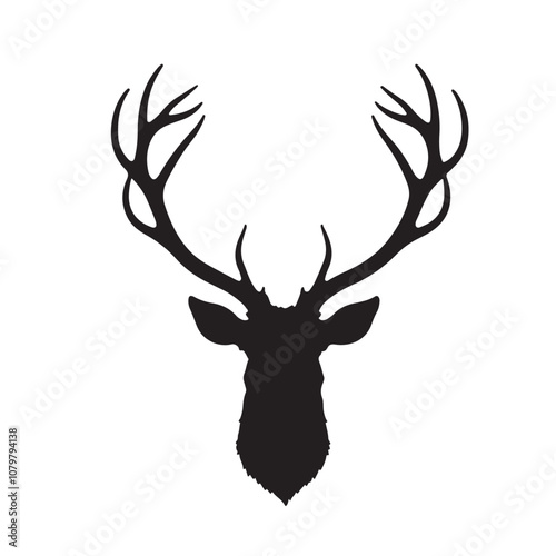 Detailed silhouette of a deer head with large antlers photo