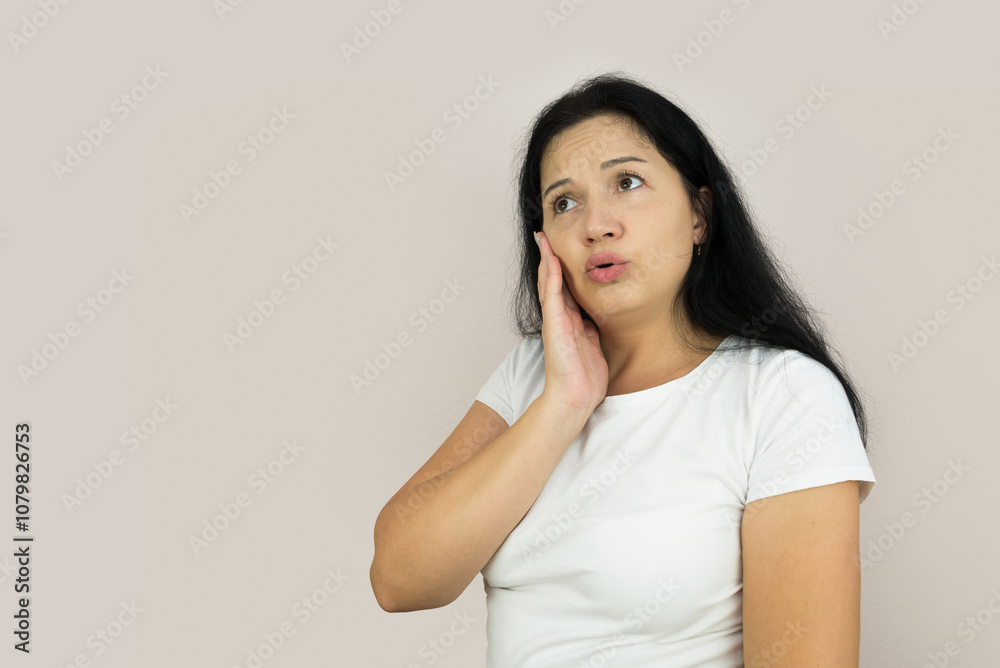 Lifestyle image of a young woman who is shocked and anxious Lifestyle image of a young woman who is shocked and anxious
