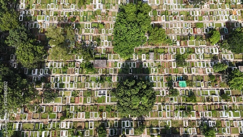 Cemetery graveyard beautiful amazing drone Aerial sky view and golden sunlight on it. Cemetery shot from the air. Huge large cemetery in a row, A high-angle drone view