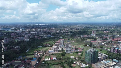 Ruiru, nairobi suburb, showing mixed urban and rural landscape under cloudy sky, aerial view photo