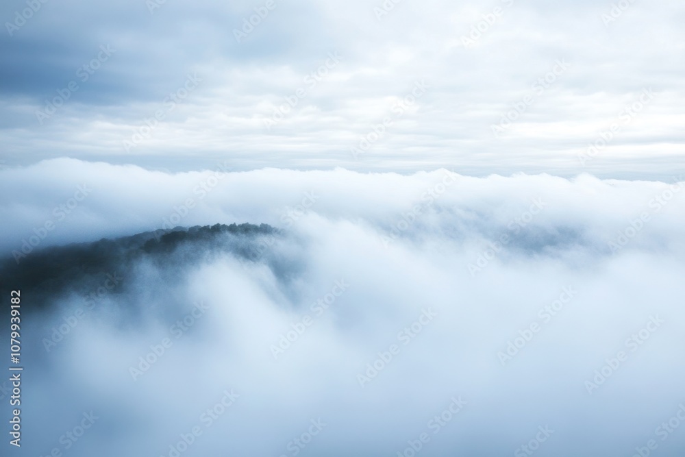 Misty mountaintop with a blanket of clouds. Misty mountaintop with a blanket of clouds.