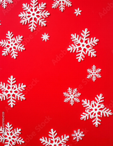 red background with white snowflakes wallpaper vertical