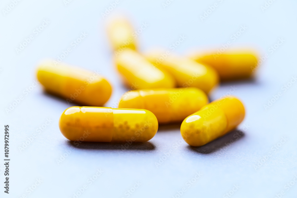 Vitamin C capsules. Bright background. Close up. Copy space. Vitamin C capsules. Bright background. Close up. Copy space.
