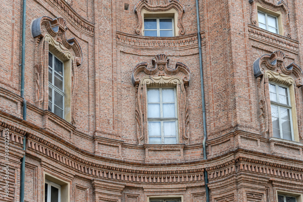 Obraz premium monumental window on Carignano Palace waving facade, Torino, Italy