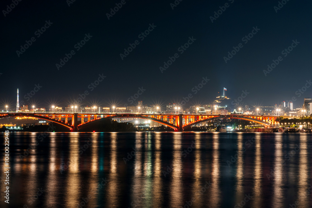 communal bridge over the Yenisei River in Krasnoyarsk at night communal bridge over the Yenisei River in Krasnoyarsk at night