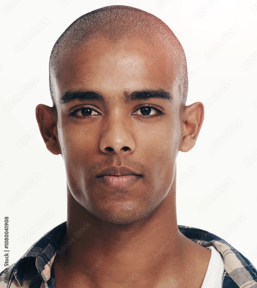 Obraz premium Portrait, confidence and man with skincare, natural beauty or bald on white studio background. Face, serious and African model with facial treatment for dermatology, healthy skin or handsome in Kenya
