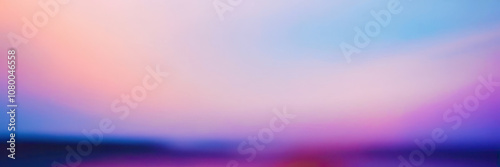 A blurry image of a sky with a purple hue