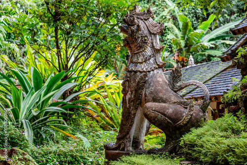 background of the sculpture of the lion carved into the ancient temple, Wat Phalat, on the way up to Doi Suthep,is beautiful and is a tourist attraction that is always popular among travelers from all photo