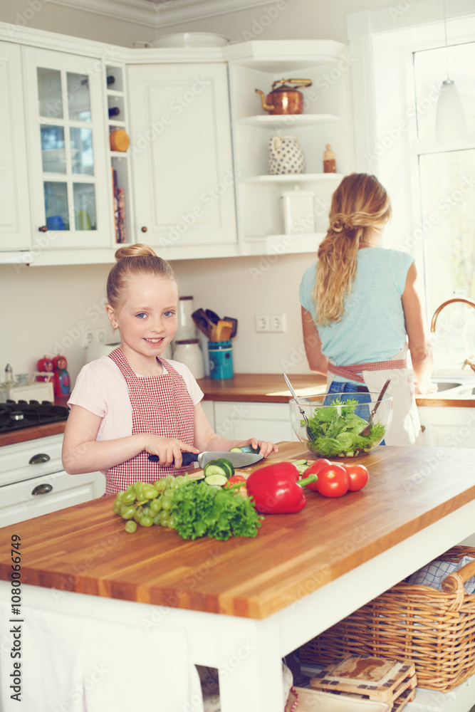 Portrait, child and cutting vegetables for salad in kitchen with ingredients, meal prep or learning healthy vegan recipe. Mother, girl or cooking together for culinary skills and helping hand in home Portrait, child and cutting vegetables for salad in kitchen with ingredients, meal prep or learning healthy vegan recipe. Mother, girl or cooking together for culinary skills and helping hand in home