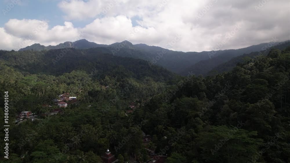 clouds over the mountains. aerial view of mountain ranges and cloudy skies clouds over the mountains. aerial view of mountain ranges and cloudy skies