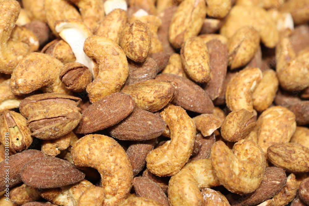 An Assortment of Delicious Roasted Nuts Mixed Together, Captured in a CloseUp View An Assortment of Delicious Roasted Nuts Mixed Together, Captured in a CloseUp View
