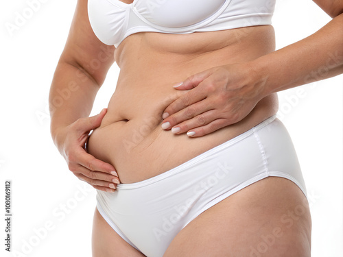 Woman hands holding Abdominal surface of fat in white swimsuit on isolated white background, Clipping path photo