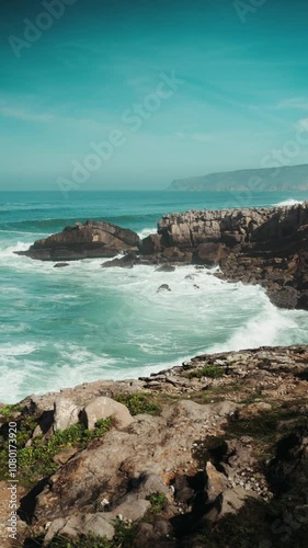 Beautiful coast line next to Lisbon Portugal ocean vertical video,