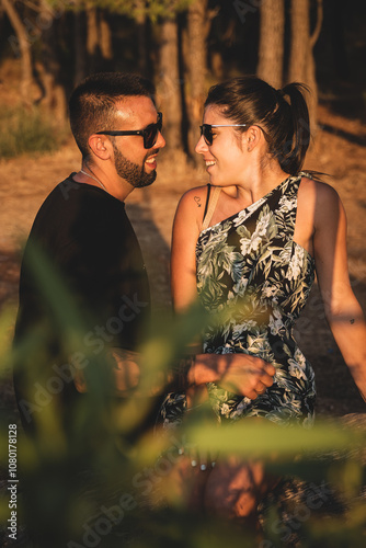 Portrait of a young couple in love at sunset