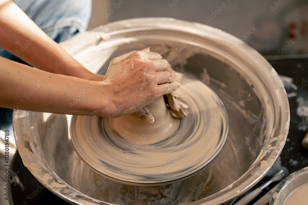 close up the clay modeling studio young girl hands giving shape to clay on a potter's wheel applied art clayware old craftsmanship close up the clay modeling studio young girl hands giving shape to clay on a potter's wheel applied art clayware old craftsmanship
