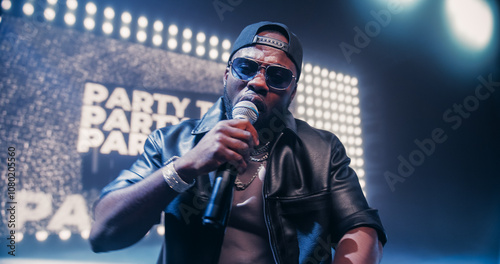 Konstfotografi Creative Rap Artist Performing a Hit Song on Stage with a Striking Female Dancer